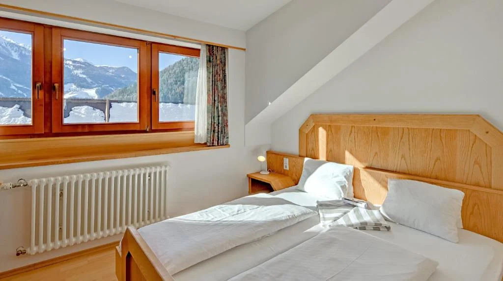 hotel-hinteregger-matrei-skiopening-spavaca-soba.webp